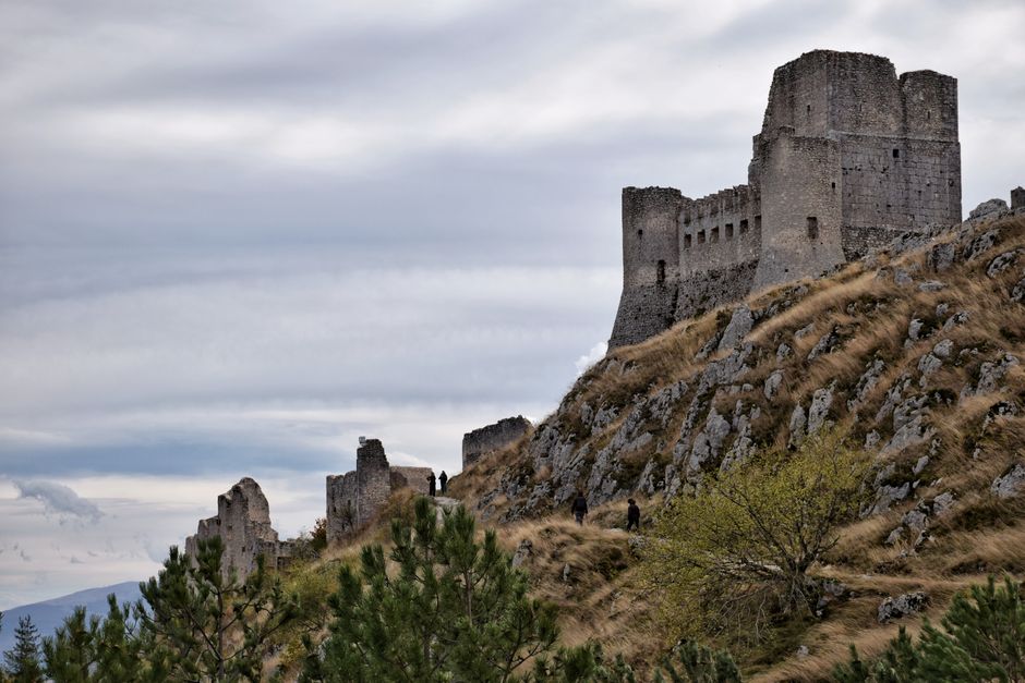 Explore the medieval Rocca Calascio castle atop scenic hills in Abruzzo, Italy.